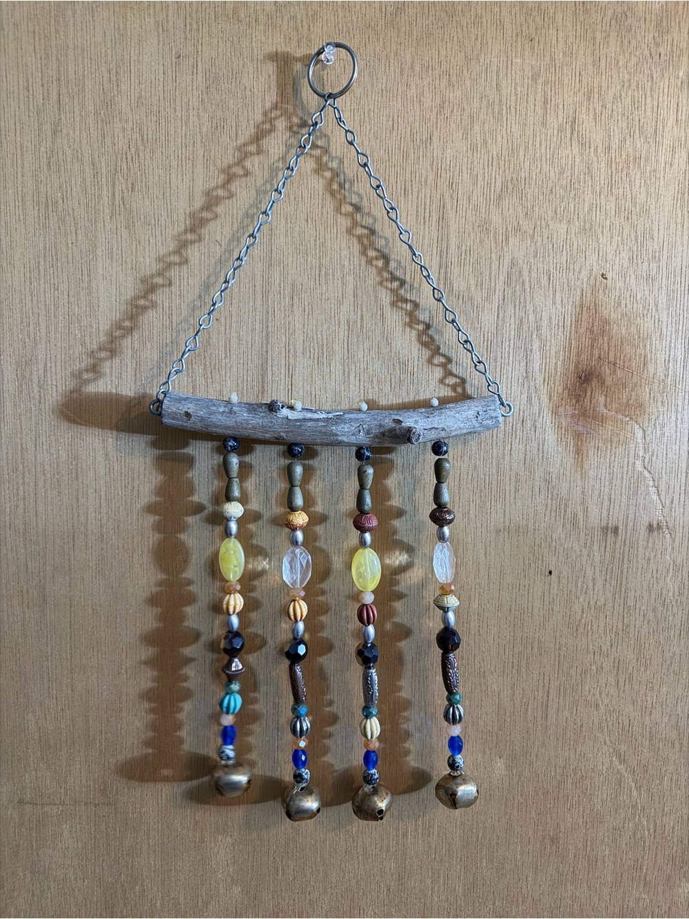 Beaded Driftwood Wall Hanging - Yellow & Neutral Accents outside wind chime
